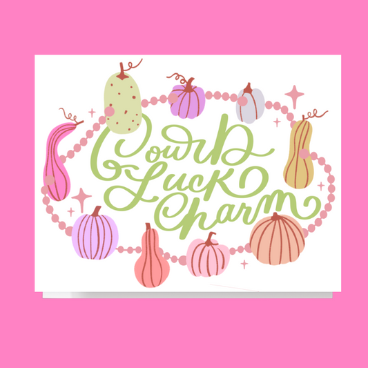 Fall greeting card design featuring the phrase Gourd Luck Charm hand lettered in script inside a beaded bracelet with pastel gourd shaped charms